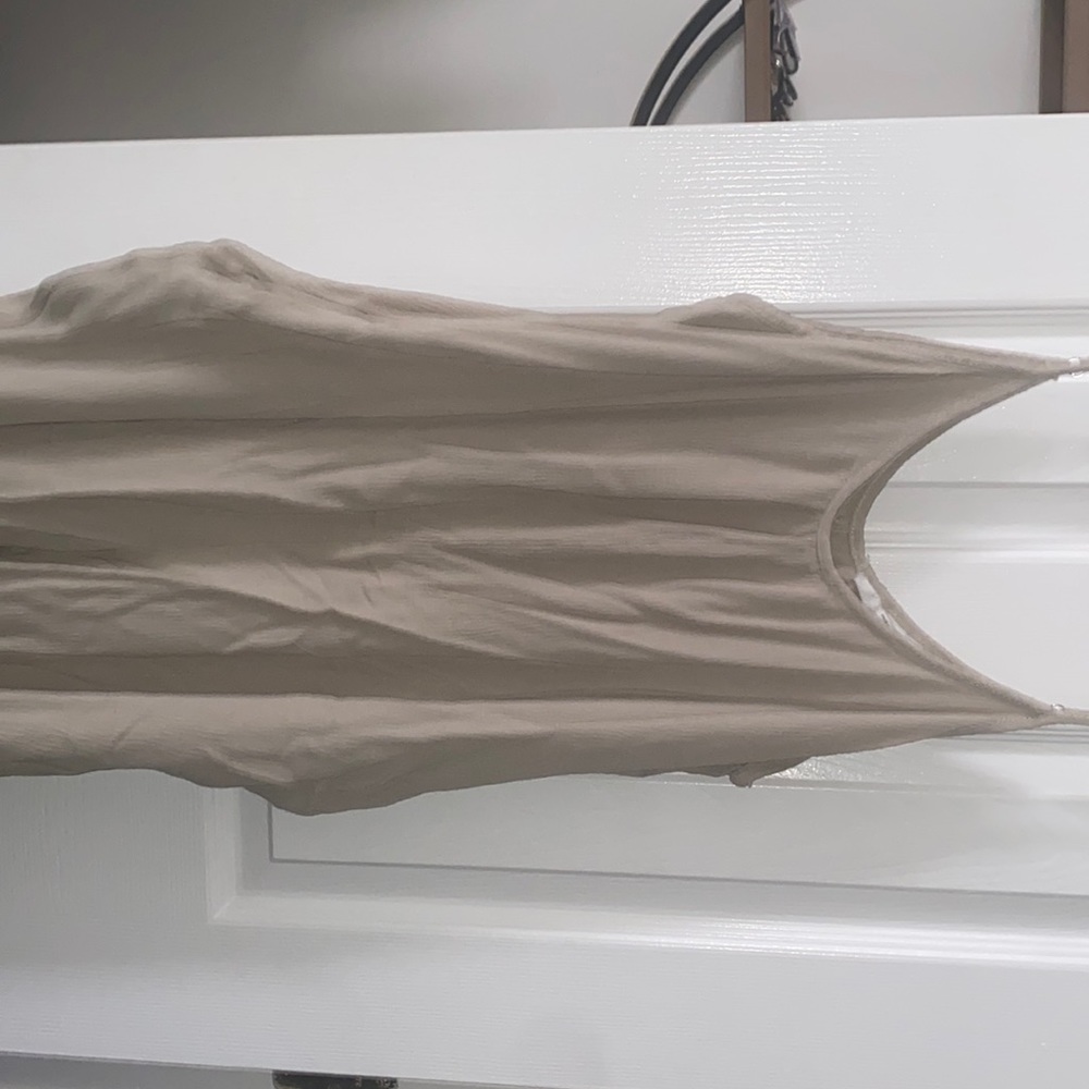 Beige wide leg jumpsuit. Never worn, smoke free home